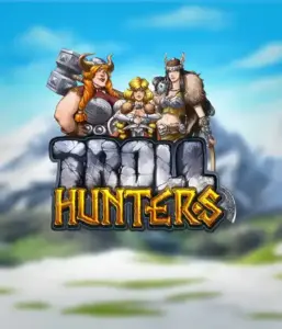 Изображение игрового автомата "Troll Hunters" от Play'N Go, где изображены три воина-викинга: две женщины и один мужчина, одетые в традиционные броню викингов. За их спинами виднеются горные вершины, что добавляет атмосферу северных легенд. Этот игровой автомат идеален для поклонников викингских саг и эпических приключений.